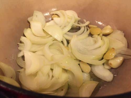 Onions and garlic being sauteed - Paleo Red Curry recipe one of the recipes in our Thai food Paleo repetoire