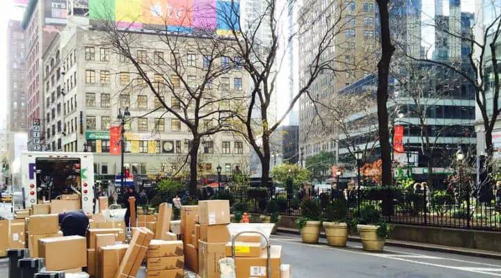 Photo taken of Fedex delivery packages in Herald Square in NYC - It is a visual for this article which is about Paleo NYC delivery companies. These 13 companies offer paleo meal delivery nyc packages and deliver to addresses in the greater New York tri-state area. All of the companies qualify as gluten free nyc delivery companies, and the majority also offer nyc organic food delivery. For those looking for paleo food delivery nyc options, this is a comprehensive guide to getting paleo nyc food delivered to your door. It basically covers all of the paleo meal delivery nyc services, whether they are local businesses (3) or national business (10) that offer meal plans that are delivered to New York City addresses. If you are looking for paleo meals delivered nyc, this is the guide for you. Many of the paleo diet delivery nyc plans offered by these companies are cost compeditive with meals available at local paleo restaurants in NY. Paleo meals nyc options are pretty good in general compared to other cities, but having access to these delivery services takes your options to another level. Whether you are looking for just organic delivery nyc options or true paleo food nyc options, these are great companies. By choosing paleo, you are by default finding companies focusing on organic meal delivery nyc options, offering organic food nyc meals. 