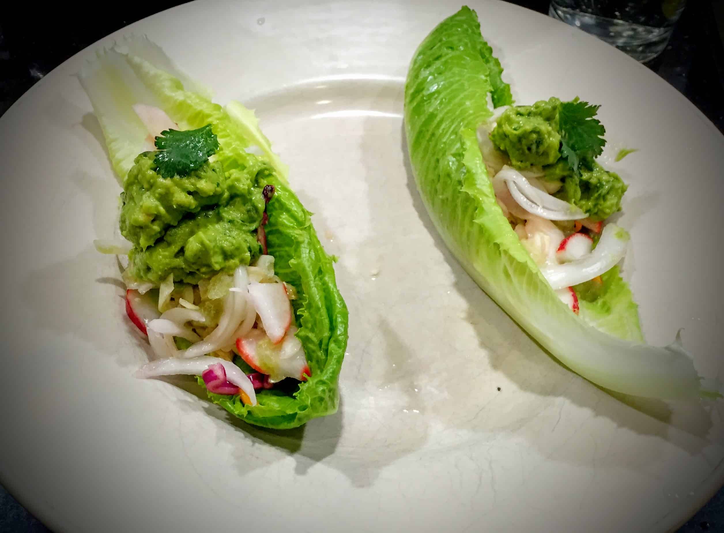 These fresh lime juice infused fish tacos are quick to make and incredibly satisfying. Not to mention healthy and very low in calories. Lime Juice is used as a base for all components, from the baked Cod with Lime-Cumin Sauce, Cabbage Radish Slaw with Lime Vinaigrette and Lime Juice based Fresh Guacamole. They are a wonderful weekday treat.