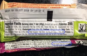 Photo of entire nutrition panel/back side of lara bar wrappers - we are trying to cover what larabars are ok on Whole30 in this article. We also discuss the sugar in larabars and talk about paleo lara bars.