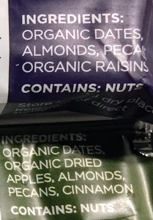 closeup photo of the ingredients in Freedom Bars, a Larabar competitor - This article both covers paleo approved larabars as well as discusses the lowest sugar larabar currently in the Whole30 range of larabar products. If you are on the lookout for the larabar with least sugar added to it, you might also want to look seriously at the Freedom Bars. 